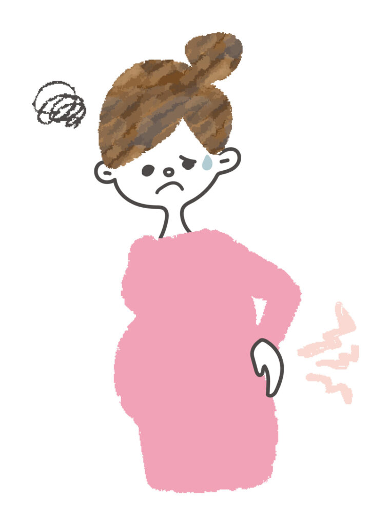 腰が重くて困っている妊婦のイラスト